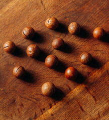 Organic Macadamia nut on wooden table