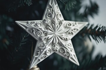 Fototapeta premium Ornate White Star Ornament Hanging on a Christmas Tree