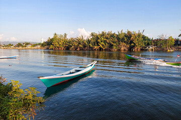 A boat on the river bank is parked