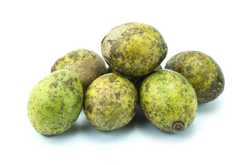 Group of fresh Spondias pinnara (L.f.) kurz or hog plum or wild (or forest) mango, Ma Kok Pa in Thai, isolated on white background close up stacking.
