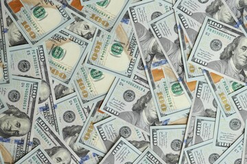 Big amount of american USD hunderd dollar bills banknotes close up