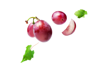 Purple Grapes floating in the air with green leaves isolated on background, popular fruit that juicy flavor and high vitamin.