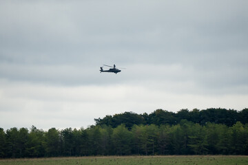 British army Boeing Apache Attack helicopter gunship AH2 AH64E AH-64E ArmyAirCorp in low level...