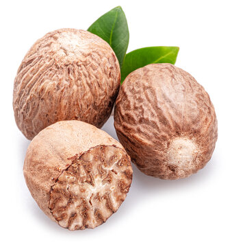 Nutmeg seeds isolated on white background.