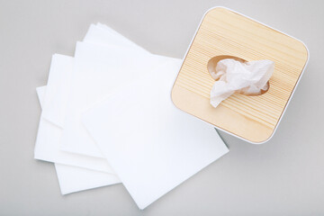 Napkin box on grey background