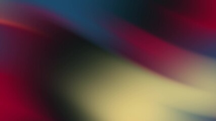 Blurred background featuring red, blue, green, yellow gradient. Suitable for vibrant designs, presentations, website backgrounds, digital art projects.