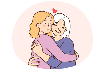 Elderly grandmother hug happy grownup daughter