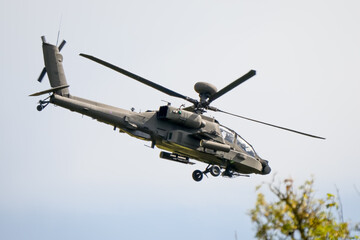 close-up side view of a British army Boeing Apache Attack helicopter gunship AH64E AH-64E...