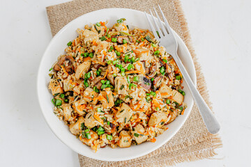 Asian Vegetable Fried Rice with Tofu and Mushroom in a Bowl Top Down Close-Up Photo