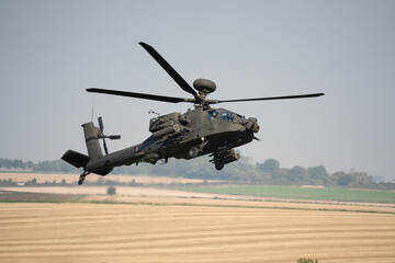 close-up front-quarter view of a British army Boeing Apache Attack helicopter gunship AH64E AH-64E...