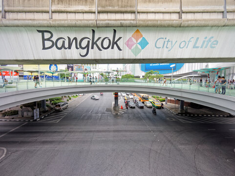 BANGKOK - OCT 2, 2024: The ONESIAM elevated skywalk at Pathumwan intersection. It connects major attractions around the area, such as National Stadium, MBK Center, Siam Square, Siam Discovery. etc.
