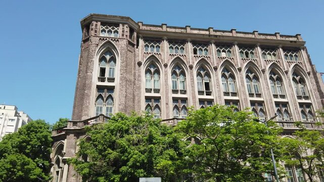 Entrance facade of Neo Gorhic Building University of Engineering at Buenos Aires Argentina urban green city park at Daylight