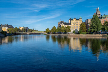 Motala Stream and Norrköping waterfront during early autumn in Sweden in the middle of September 2024