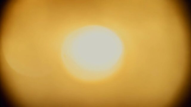 authentic Super 8 film scan features dynamic sun lens flares sprocket holes ideal overlays that evoke vintage retro look modern digital footage while incorporating classic camera sounds overlay