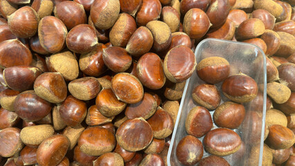 Raw chestnut at the market stall