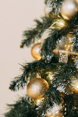 Christmas balls in close-up on the Christmas tree. Decorations for Christmas trees. The concept of celebrating New Year and Christmas