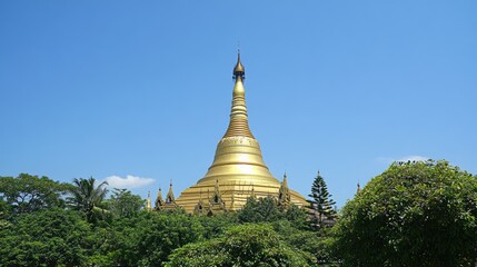 Fototapeta premium Stunning Golden Pagoda Surrounded by Lush Greenery