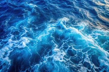Fototapeta premium Blue frothy sea water surface from above