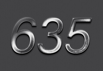 Chrome metal 3D number design of 635 on grey background.