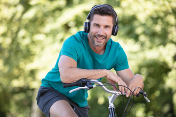 man listening to music a after a bike ride