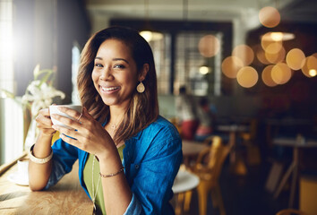 Happy woman, portrait and coffee with cup at cafe for morning beverage, drink or caffeine at indoor...