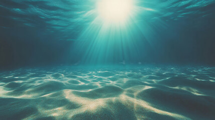 Fototapeta premium underwater scene with a light blue sea and a sandy ocean floor, illuminated by abstract patterns of sunlight filtering through the water's surface.
