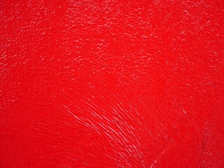 Red cement wall, old and dirty surface.