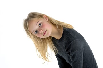 Naklejka premium A young girl posing for a photo shoot or perhaps a self-portrait