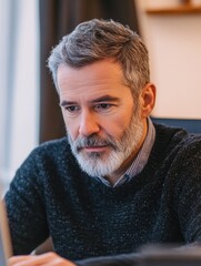 Fototapeta premium Contemplative Man in a Home Office