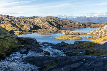 A beautiful autumn landscape with mountain lake in Northern Norway. Seasonal scenery of Scandinavia.