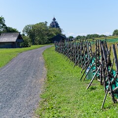  Kizhi Island, Russia, July 10, 2024. Road among fields.                              