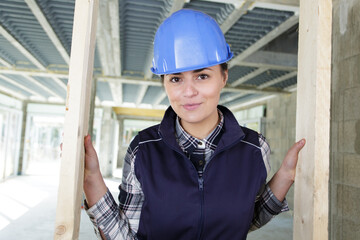 woman builder looking at camera