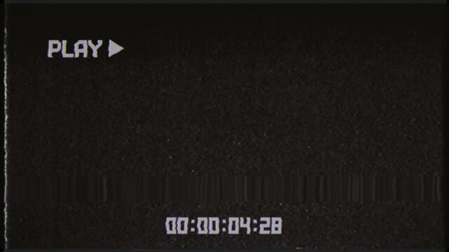 This is stock motion graphic shows a vintage VHS play screen overlay with timecode in a seamless loop.