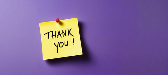 Thank you note pinned on purple background expressing gratitude