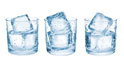 Three glasses filled with ice cubes against a black background, creating a refreshing, cool ambiance.