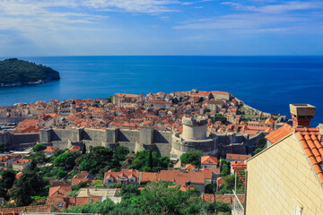 A panoramic view of Dubrovnik Croatia showcasing ancient walls and beautiful coastal scenery under a clear blue sky