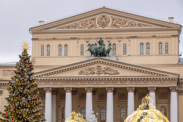 Fototapeta premium One of the most significant opera and ballet theaters in the world. The State Academic Bolshoi Theatre of Russia. There is a Christmas tree with decorations in front of the Opera and Ballet Theater.