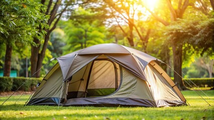 Camping tent pitched in the yard with trees in background