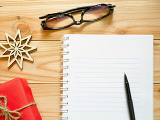 Notebook and pen for writing New Year's Resolutions