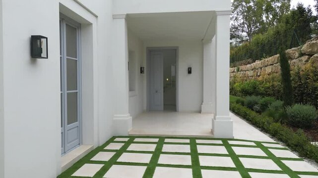 flying towards the front door of multi million estate mansion house villa in marbella spain