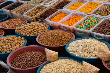 Colorful selection of spices and nuts at a bustling market in Turkey showcasing local flavors and culinary traditions