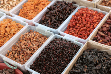 Colorful assortment of dried fruits and nuts displayed at a marketplace in Turkey showcasing local flavors and healthy snacks
