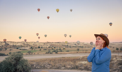 Experience the breathtaking hot air balloon festival at sunrise over Cappadocia stunning landscape with joyful visitors