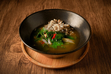 Laab Thaifood menu, raw food. laab moo mee of the North Lanna Thai food style, on table background. thaifood concept. Lanna Thai food.