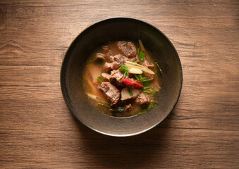 Laab Thaifood menu, raw food. laab moo mee of the North Lanna Thai food style, on table background. thaifood concept. Lanna Thai food.