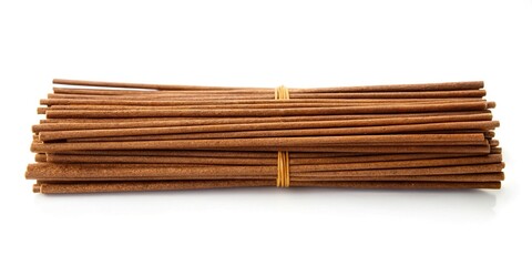 Brown agarbatti or incense sticks isolated on white background symmetrical