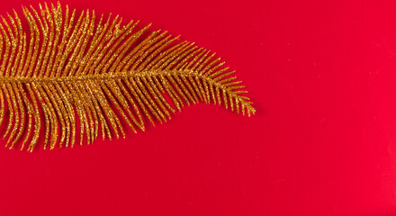 Christmas decoration of leaves on a dark red background
