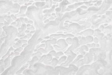 Empty rough white natural stone surface for abstract background and texture. beautiful patterns, space for work, banner, wallpaper close up.