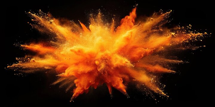 abstract orange powder explosion on black background