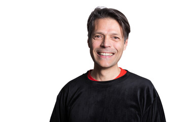 Middle-aged man in casual clothes on white background, smiling at the camera.